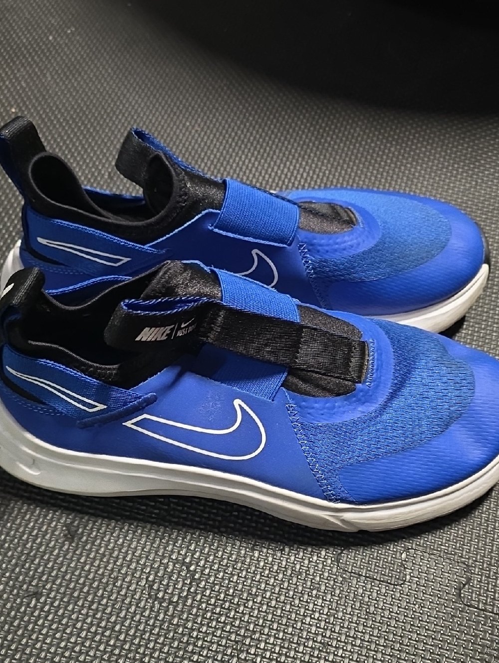 Nike Kids Slip-On Sneakers in Bright Blue with White Swoosh
